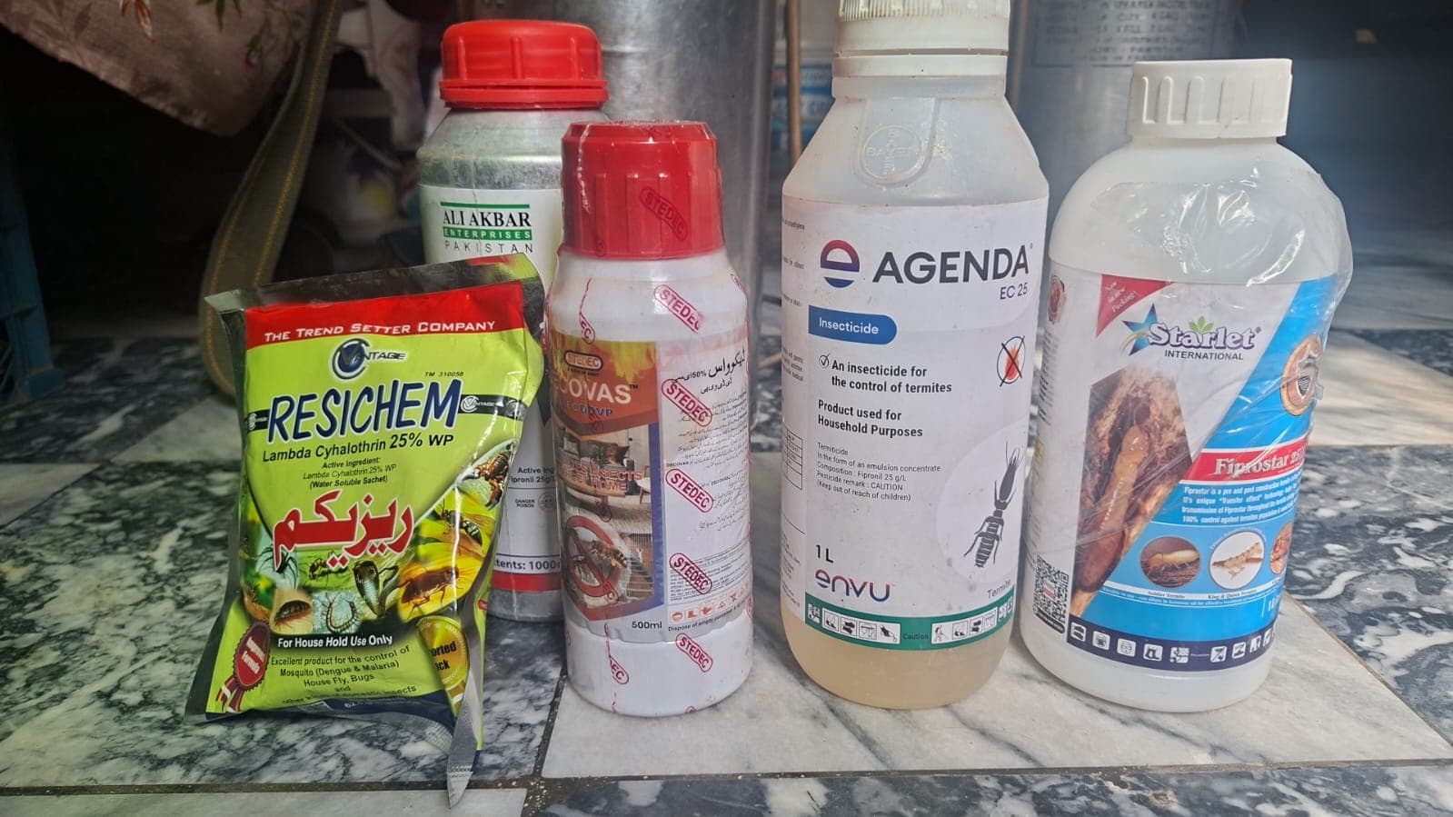 Pest control technician preparing treatment in Islamabad